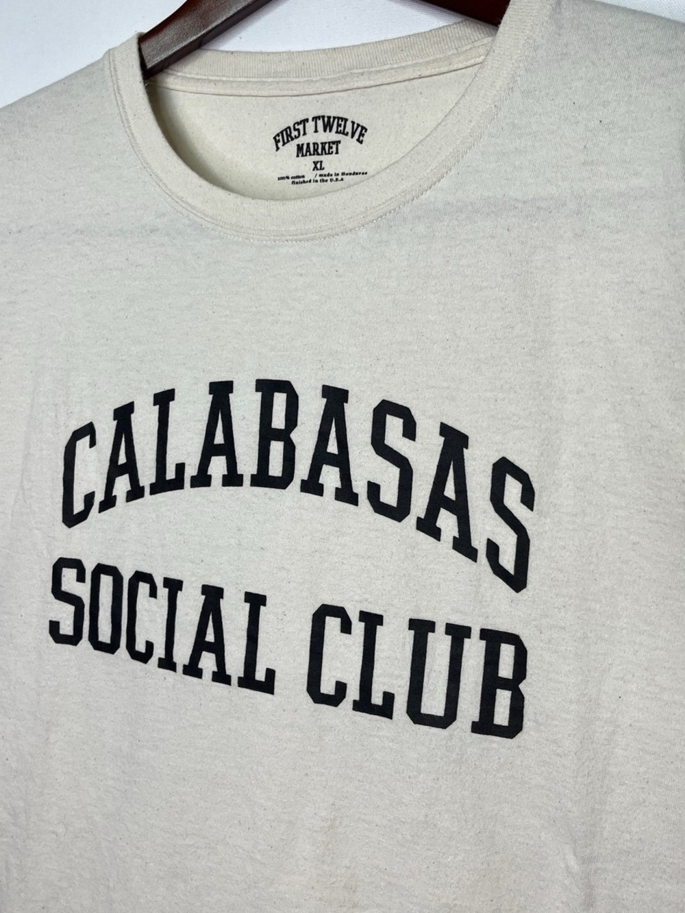 Firstport Cream Crewneck Tee with Black Logo